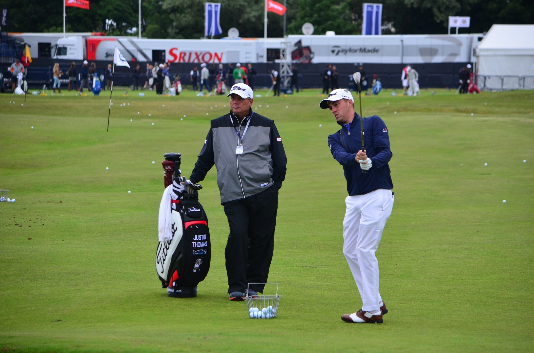 Justin Thomas and his caddy getting to grips with...